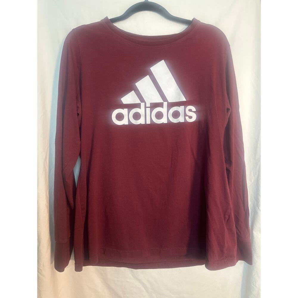 Classic women’s long sleeve Adidas shirt.
